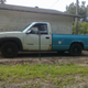 21 bags of concrete (1680 lbs) onboard, sags the bed rail down to about 48 inches